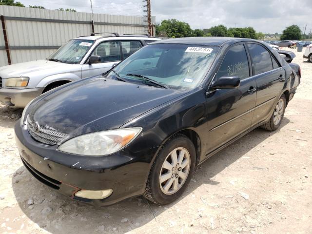 Photo 2 from auction – 2003 TOYOTA CAMRY LE with VIN JTDBF32K230115727