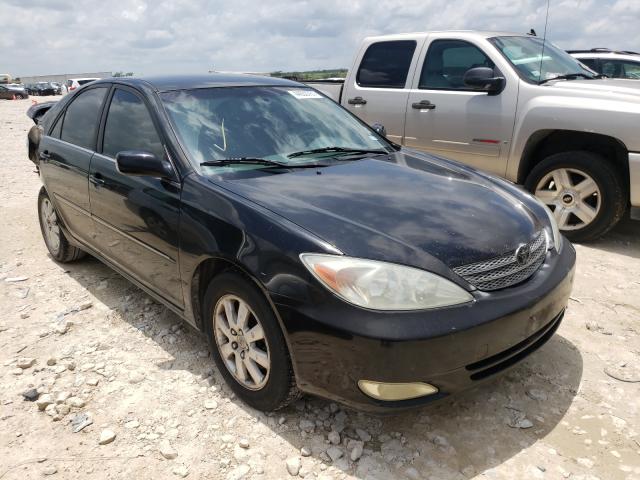 TOYOTA CAMRY LE 2003 with VIN JTDBF32K230115727 - Photo from auction
