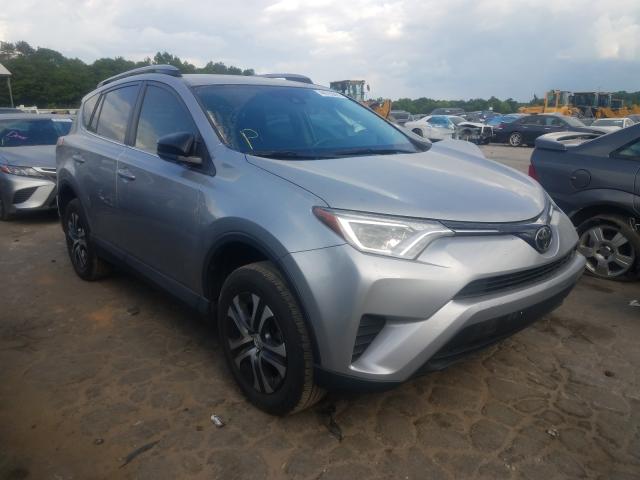TOYOTA RAV4 LE 2018 with VIN 2T3ZFREV9JW429701 - Photo from auction