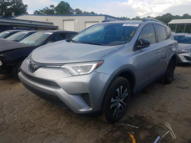 Photo 2 from auction – 2018 TOYOTA RAV4 LE with VIN 2T3ZFREV9JW429701