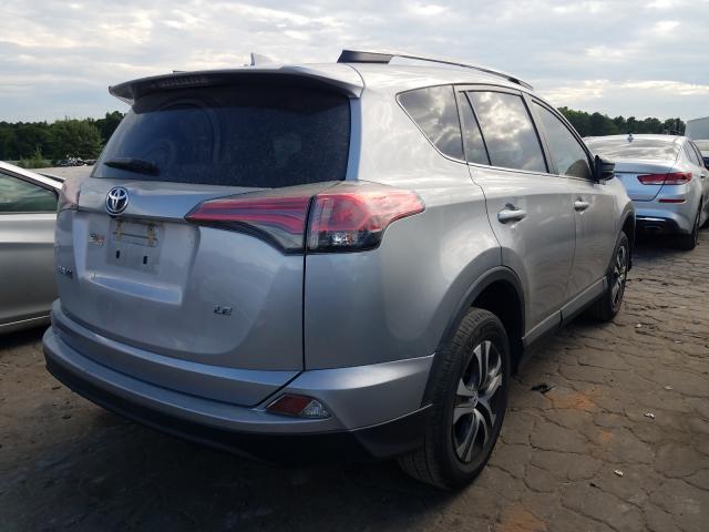 Photo 4 from auction – 2018 TOYOTA RAV4 LE with VIN 2T3ZFREV9JW429701