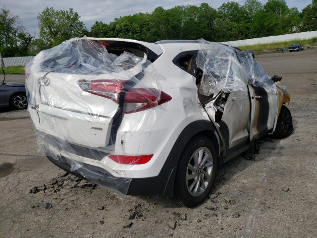 Photo 4 from auction – 2017 HYUNDAI TUCSON LIM with VIN KM8J3CA40HU293719