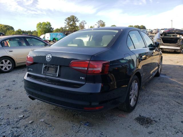 Photo 4 from auction – 2017 VOLKSWAGEN JETTA S with VIN 3VW2B7AJ0HM268295