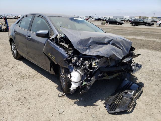 TOYOTA COROLLA L 2017 with VIN 5YFBURHE0HP587285 - Photo from auction