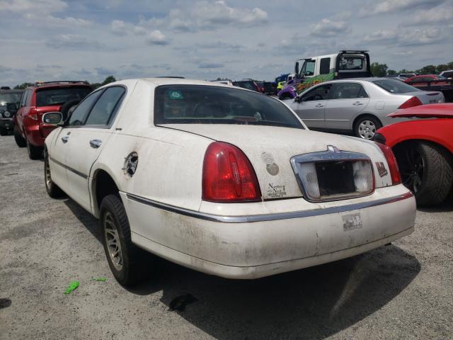 Photo 3 from auction – 2002 LINCOLN TOWN CAR S with VIN 1LNHM82WX2Y615744
