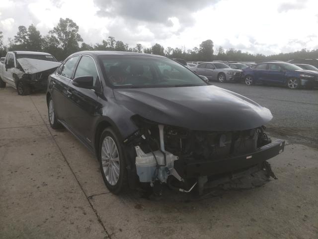 TOYOTA AVALON HYB 2014 with VIN 4T1BD1EB4EU024956 - Photo from auction