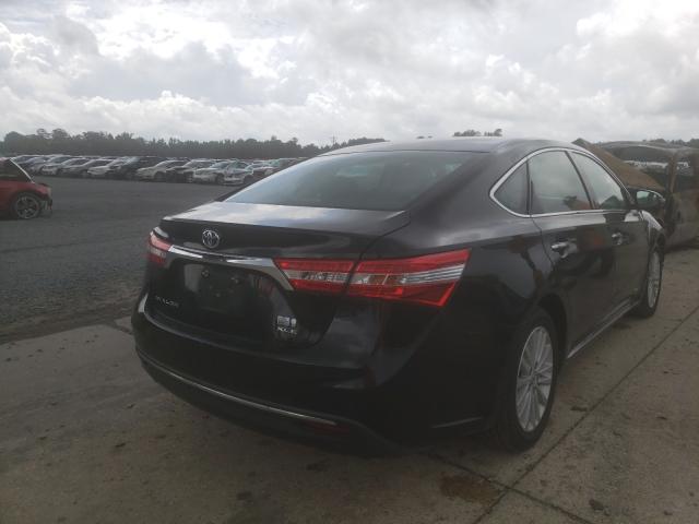 Photo 4 from auction – 2014 TOYOTA AVALON HYB with VIN 4T1BD1EB4EU024956