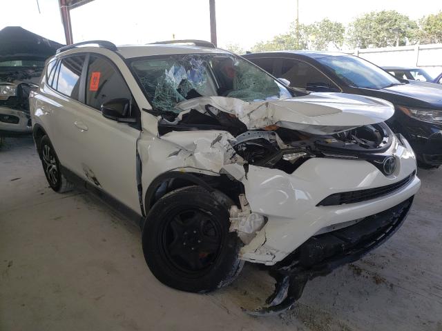 TOYOTA RAV4 LE 2017 with VIN JTMZFREV0HJ715834 - Photo from auction