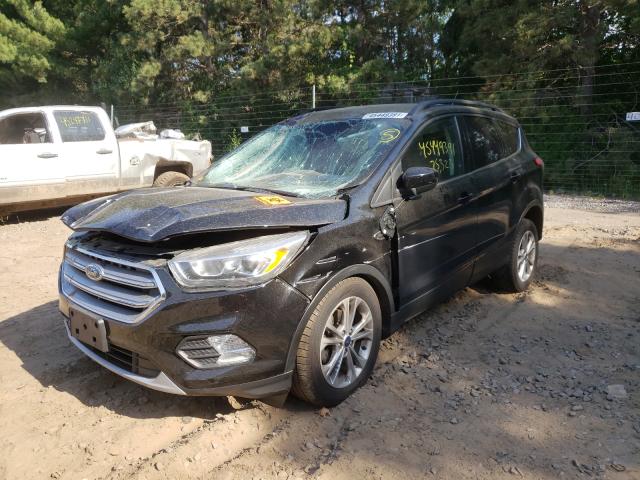 Photo 2 from auction – 2017 FORD ESCAPE SE with VIN 1FMCU0GD7HUC63533
