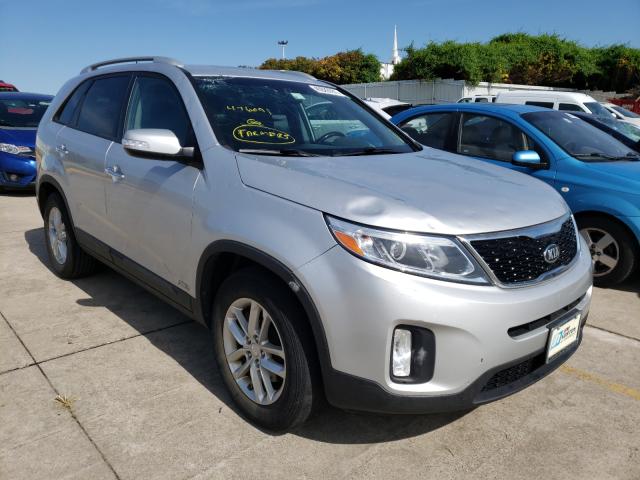 KIA SORENTO LX 2014 with VIN 5XYKTCA69EG476091 - Photo from auction