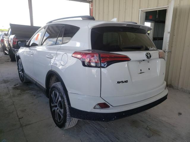 Photo 3 from auction – 2017 TOYOTA RAV4 LE with VIN JTMZFREV0HJ715834