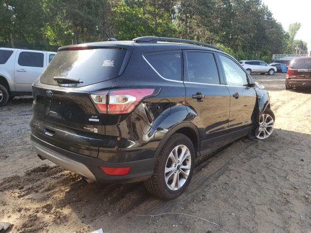 Photo 4 from auction – 2017 FORD ESCAPE SE with VIN 1FMCU0GD7HUC63533