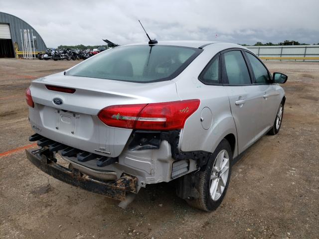 Photo 4 from auction – 2016 FORD FOCUS SE with VIN 1FADP3F23GL241847