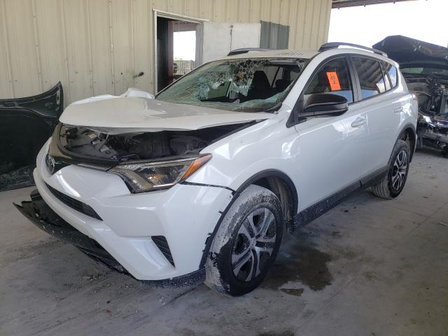 Photo 2 from auction – 2017 TOYOTA RAV4 LE with VIN JTMZFREV0HJ715834