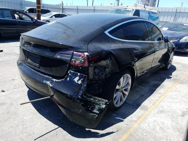 Photo 4 from auction – 2019 TESLA MODEL 3 with VIN 5YJ3E1EA7KF327747