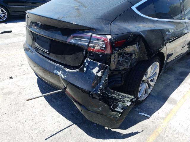 Photo 9 from auction – 2019 TESLA MODEL 3 with VIN 5YJ3E1EA7KF327747