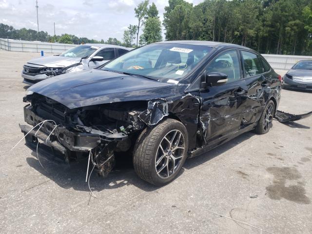 Photo 2 from auction – 2016 FORD FOCUS SE with VIN 1FADP3F21GL228319