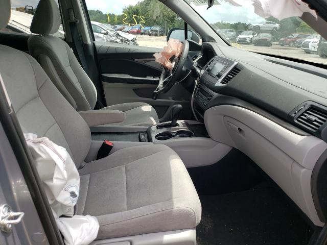 Photo 5 from auction – 2020 HONDA PILOT LX with VIN 5FNYF5H13LB027033
