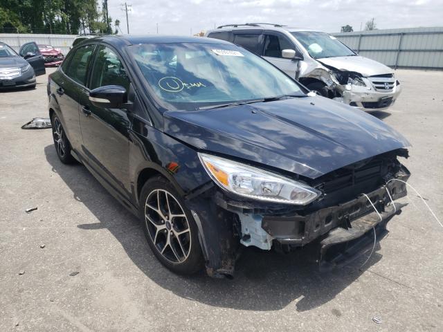 FORD FOCUS SE 2016 with VIN 1FADP3F21GL228319 - Photo from auction