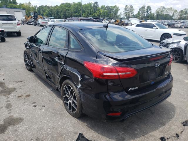Photo 3 from auction – 2016 FORD FOCUS SE with VIN 1FADP3F21GL228319