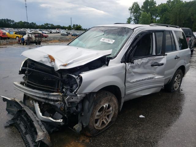 Photo 9 from auction – 2004 HONDA PILOT EX with VIN 2HKYF18434H520233