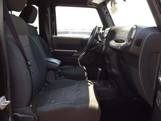 Photo 5 from auction – 2012 JEEP WRANGLER U with VIN 1C4HJWDG7CL240465