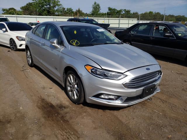 FORD FUSION TIT 2017 with VIN 3FA6P0SU8HR303762 - Photo from auction
