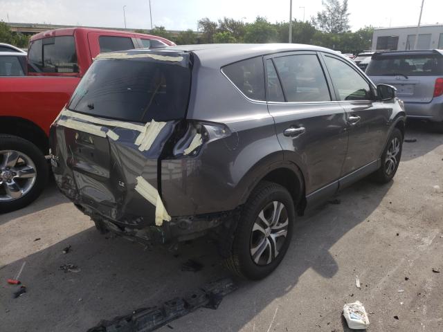 Photo 4 from auction – 2016 TOYOTA RAV4 LE with VIN JTMZFREV3GJ088495