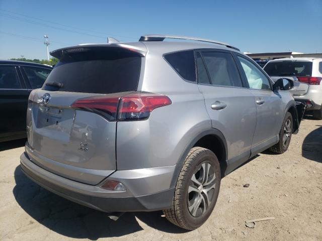 Photo 4 from auction – 2016 TOYOTA RAV4 LE with VIN 2T3BFREV9GW428073