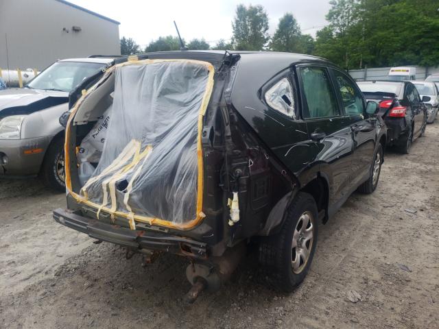 Photo 4 from auction – 2014 HONDA CR-V LX with VIN 2HKRM4H37EH706796