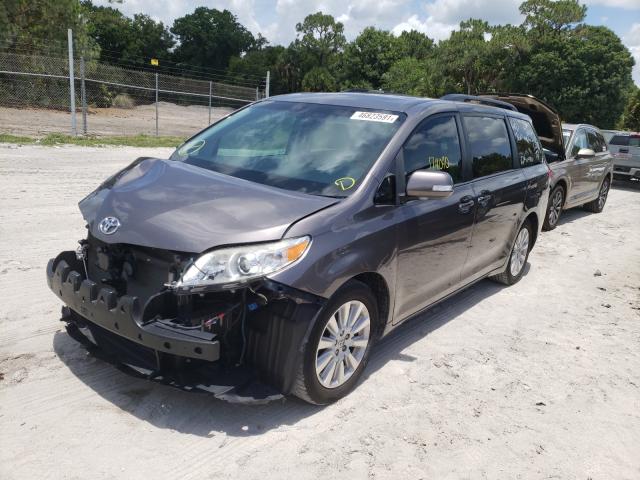 Photo 2 from auction – 2014 TOYOTA SIENNA XLE with VIN 5TDYK3DC2ES409964