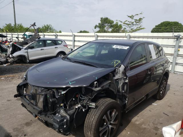 Photo 2 from auction – 2016 TOYOTA RAV4 LE with VIN JTMZFREV3GJ088495