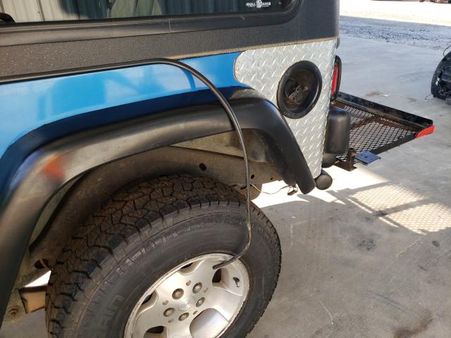 Photo 10 from auction – 2003 JEEP WRANGLER C with VIN 1J4FA39S23P308547