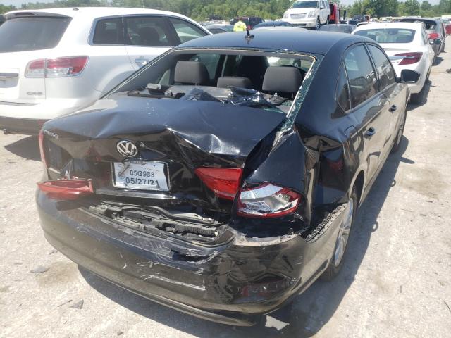 Photo 9 from auction – 2013 VOLKSWAGEN PASSAT S with VIN 1VWAH7A30DC027635