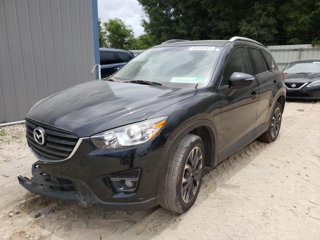 Photo 2 from auction – 2016 MAZDA CX-5 GT with VIN JM3KE4DY3G0749782