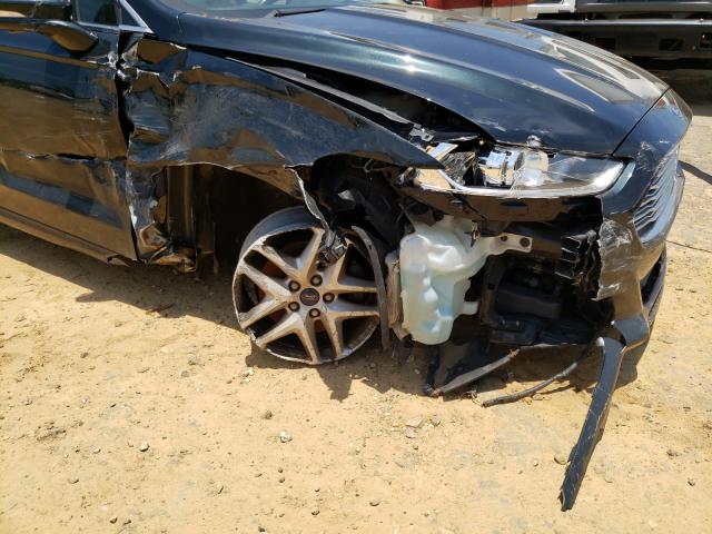 Photo 10 from auction – 2014 FORD FUSION SE with VIN 3FA6P0HD7ER186940