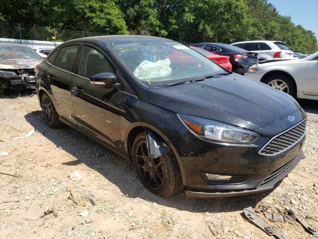 FORD FOCUS SE 2016 with VIN 1FADP3F27GL372005 - Photo from auction