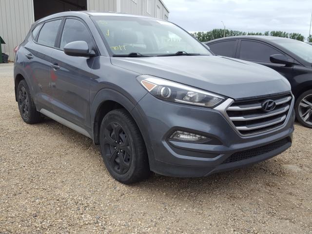 Photo 1 from auction – 2018 HYUNDAI TUCSON SE with VIN KM8J2CA43JU604312