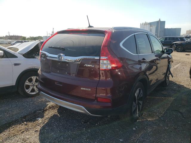 Photo 4 from auction – 2016 HONDA CR-V with VIN 5J6RM4H98GL070371