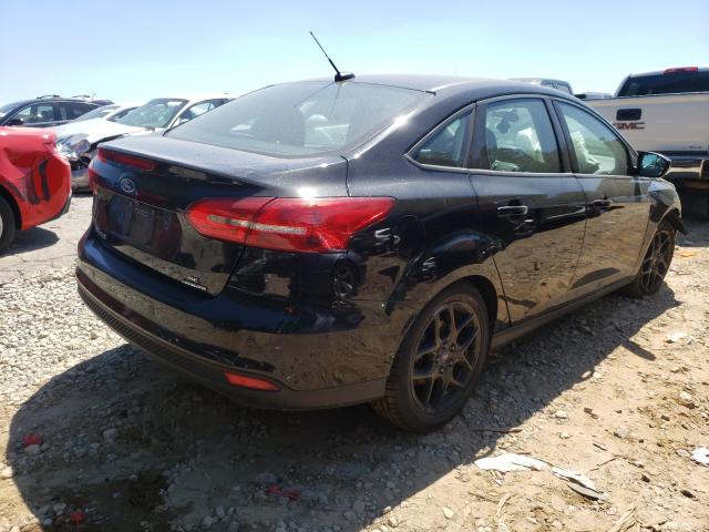 Photo 4 from auction – 2016 FORD FOCUS SE with VIN 1FADP3F27GL372005