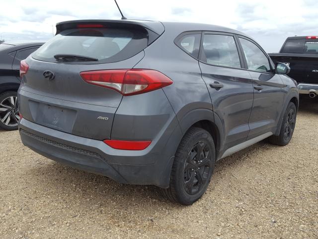 Photo 4 from auction – 2018 HYUNDAI TUCSON SE with VIN KM8J2CA43JU604312