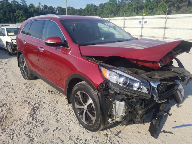 KIA SORENTO EX 2016 with VIN 5XYPHDA54GG120512 - Photo from auction