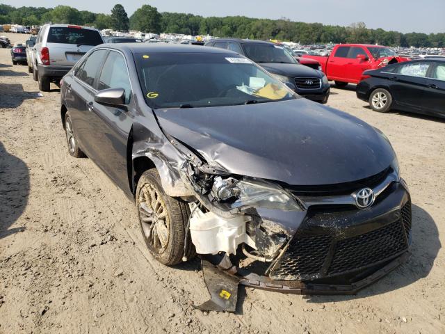 TOYOTA CAMRY LE 2016 with VIN 4T1BF1FK0GU129764 - Photo from auction