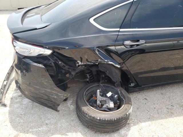 Photo 9 from auction – 2018 FORD FUSION TIT with VIN 3FA6P0RU2JR205743