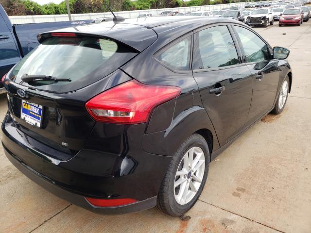 Photo 4 from auction – 2017 FORD FOCUS SE with VIN 1FADP3K27HL249859