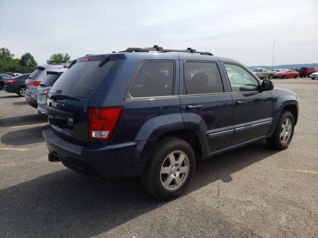 Photo 4 from auction – 2009 JEEP GRAND CHER with VIN 1J8GR48K69C524727
