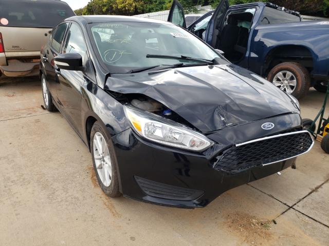 FORD FOCUS SE 2017 with VIN 1FADP3K27HL249859 - Photo from auction