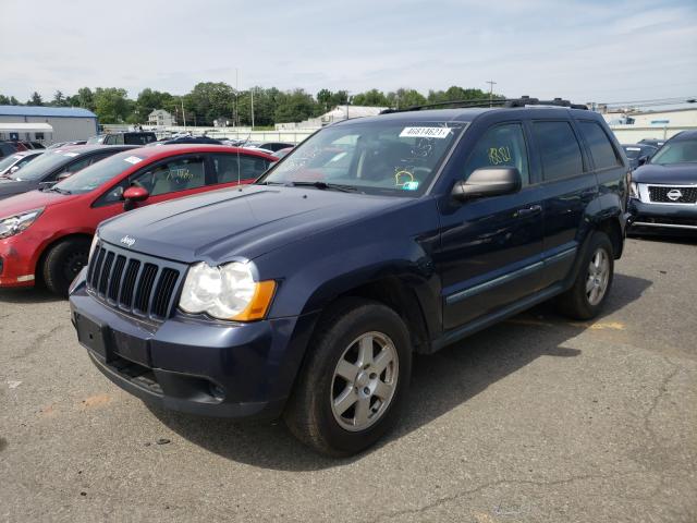 Photo 2 from auction – 2009 JEEP GRAND CHER with VIN 1J8GR48K69C524727