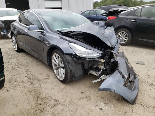 TESLA MODEL 3 2018 with VIN 5YJ3E1EB2JF188182 - Photo from auction