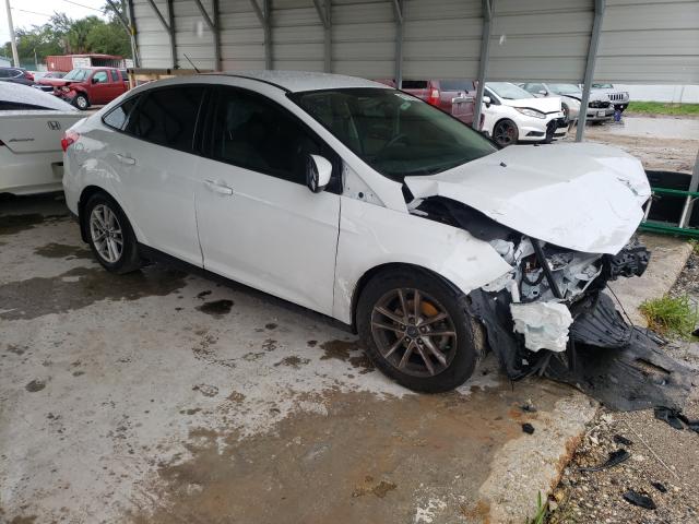FORD FOCUS SE 2018 with VIN 1FADP3F21JL308257 - Photo from auction